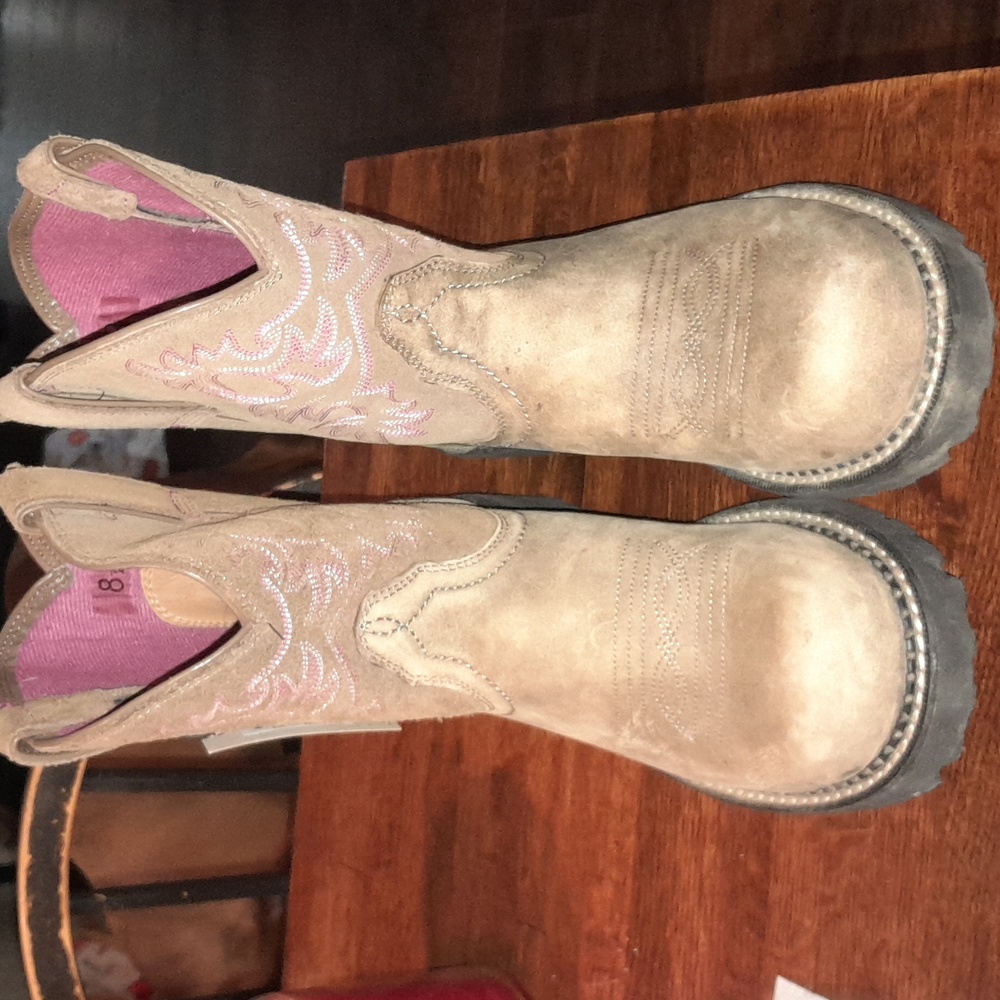 Brand new Ariat boots with pink design on both side of boots. Suede boots